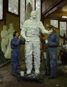 Bonny and Bill help prepare silicone rubber mould for Richie Benaud sculpture