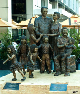 "Life from a Suitcase" Celebrating immigration into Australia, Life size, cast bronze, 9 figures taking 18 months to complete, weighs 2 tonne, located at Pyrmont Wharf, Sydney.